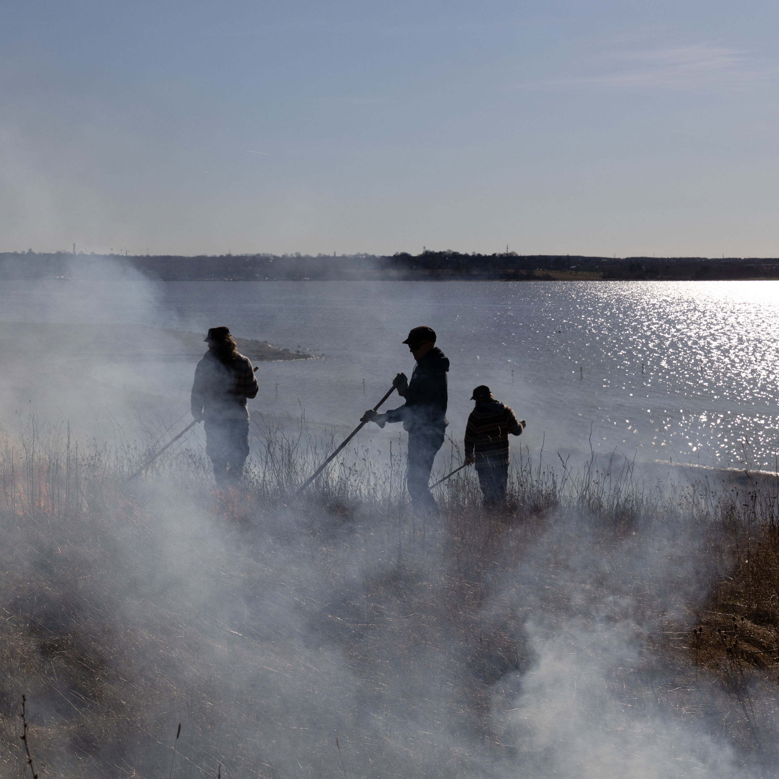 Afbrænding ved Vigen Strandpark med udsigt over fjorden og domkirken.