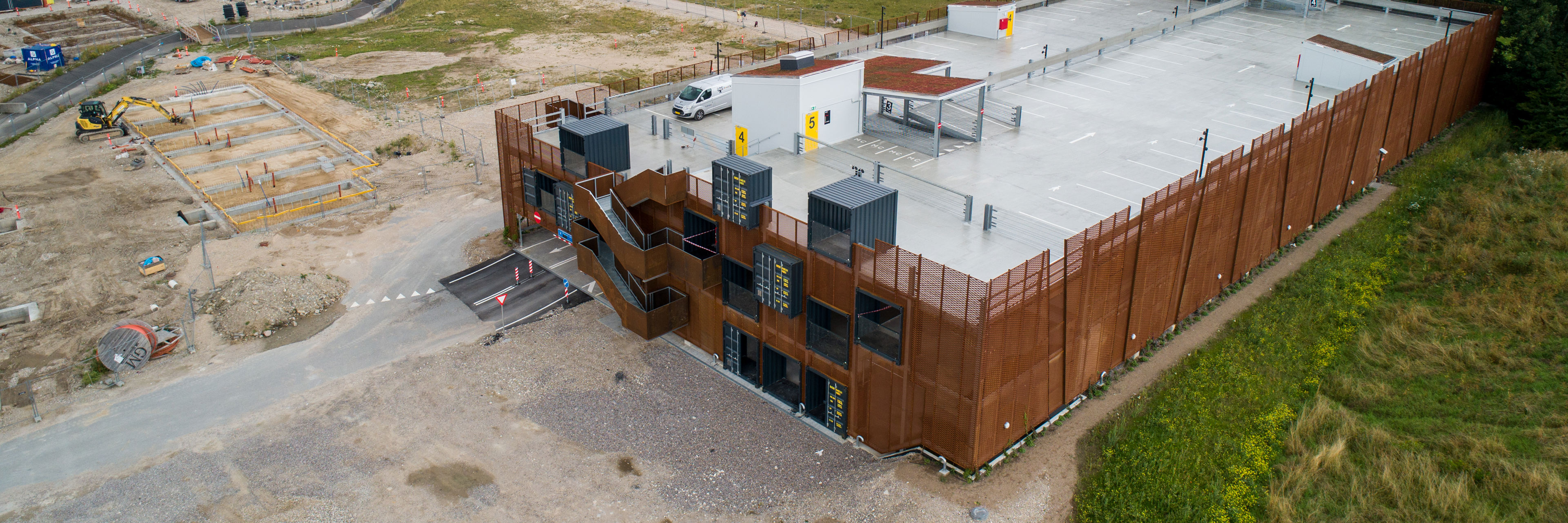 Musicon-kvateret Indfaldet med bydelens første parkeringshus i forgrunden